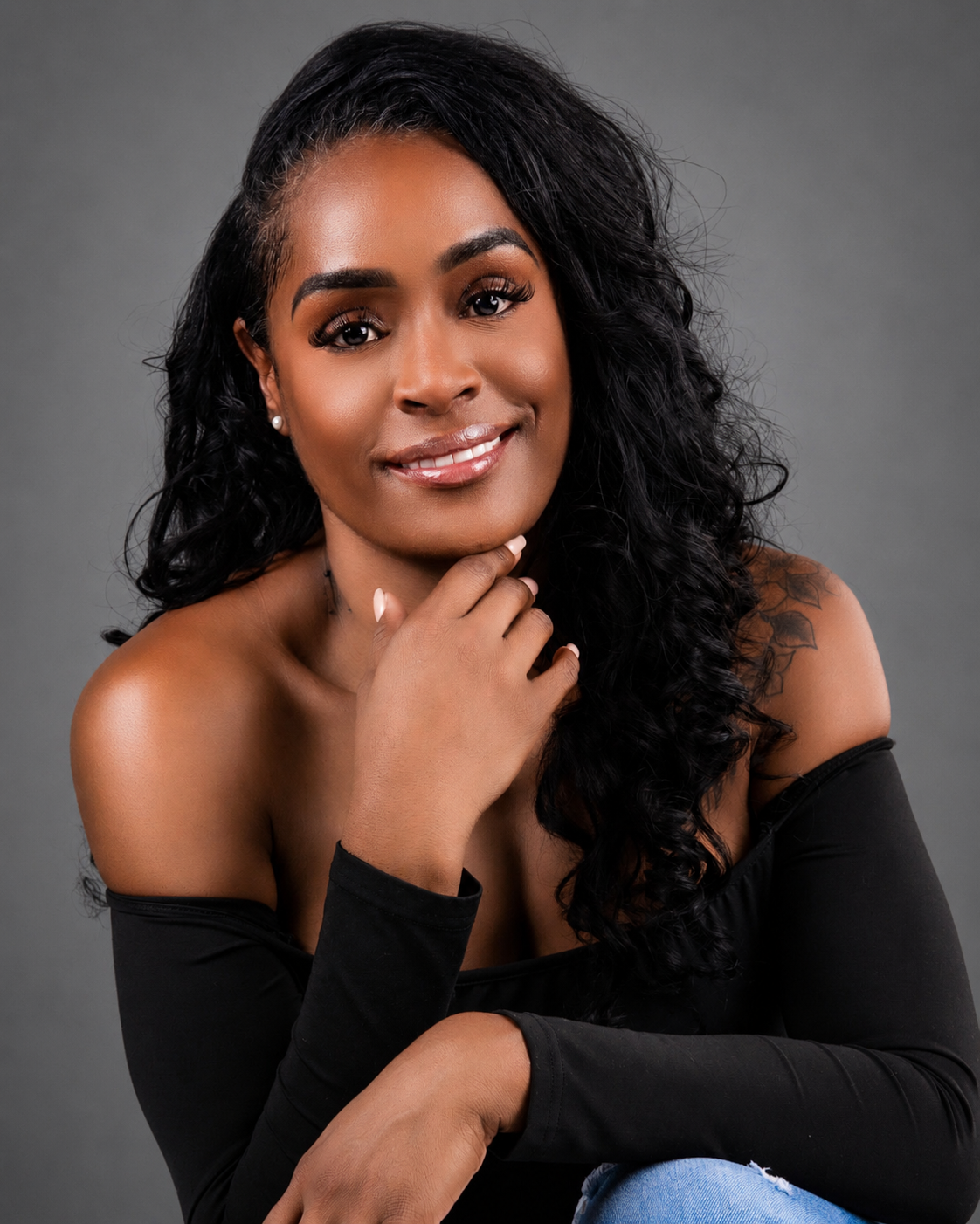 Aubree Bravo headshot — white tank, big smile