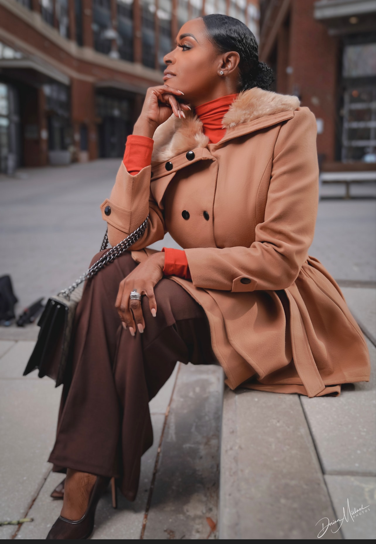 Aubree Bravo — camel coat, orange turtleneck, full length